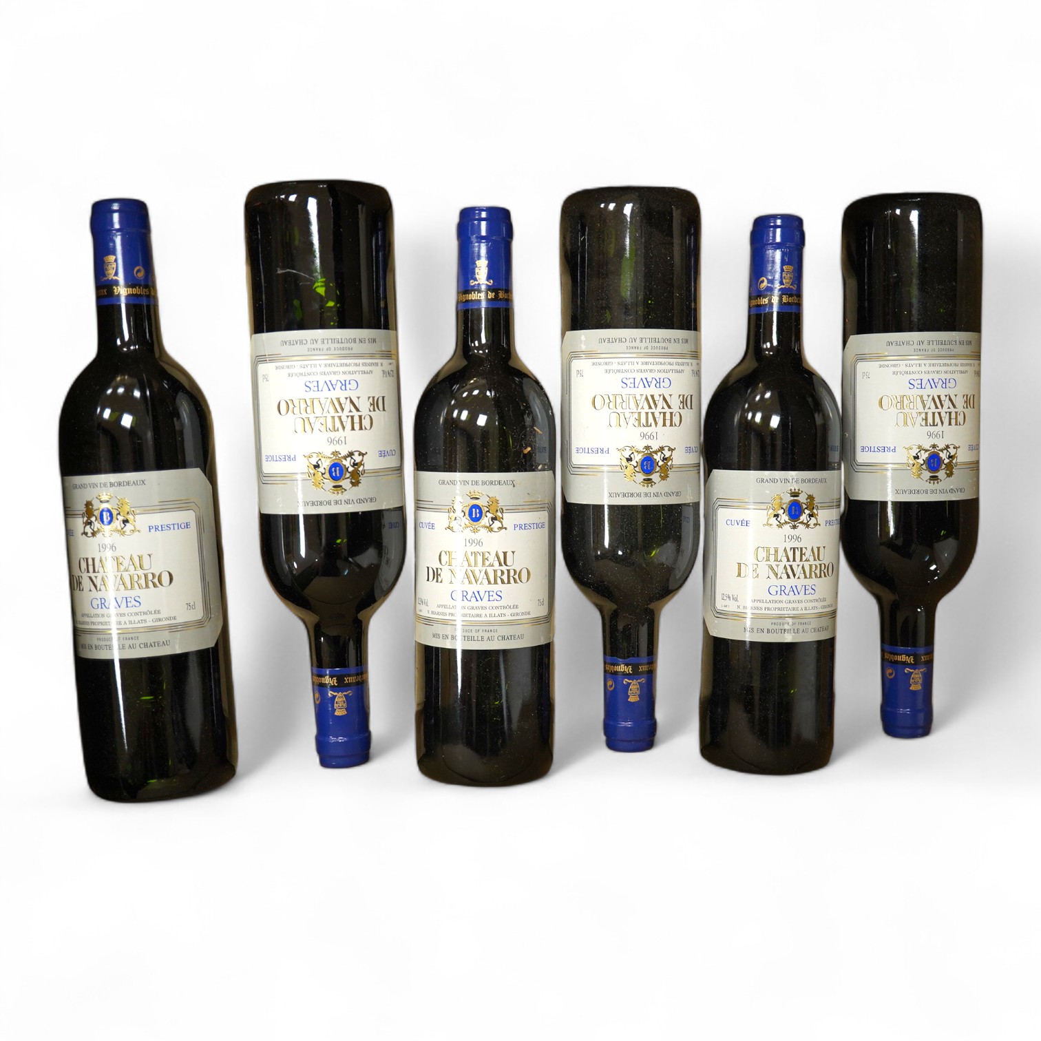 A box of twelve Chateau de Navarro Graves, six bottles 1996 and six bottles 1993, condition - unknown storage.